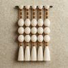 Elegant handmade fiber wall hanging in neutral tones – Flâneur